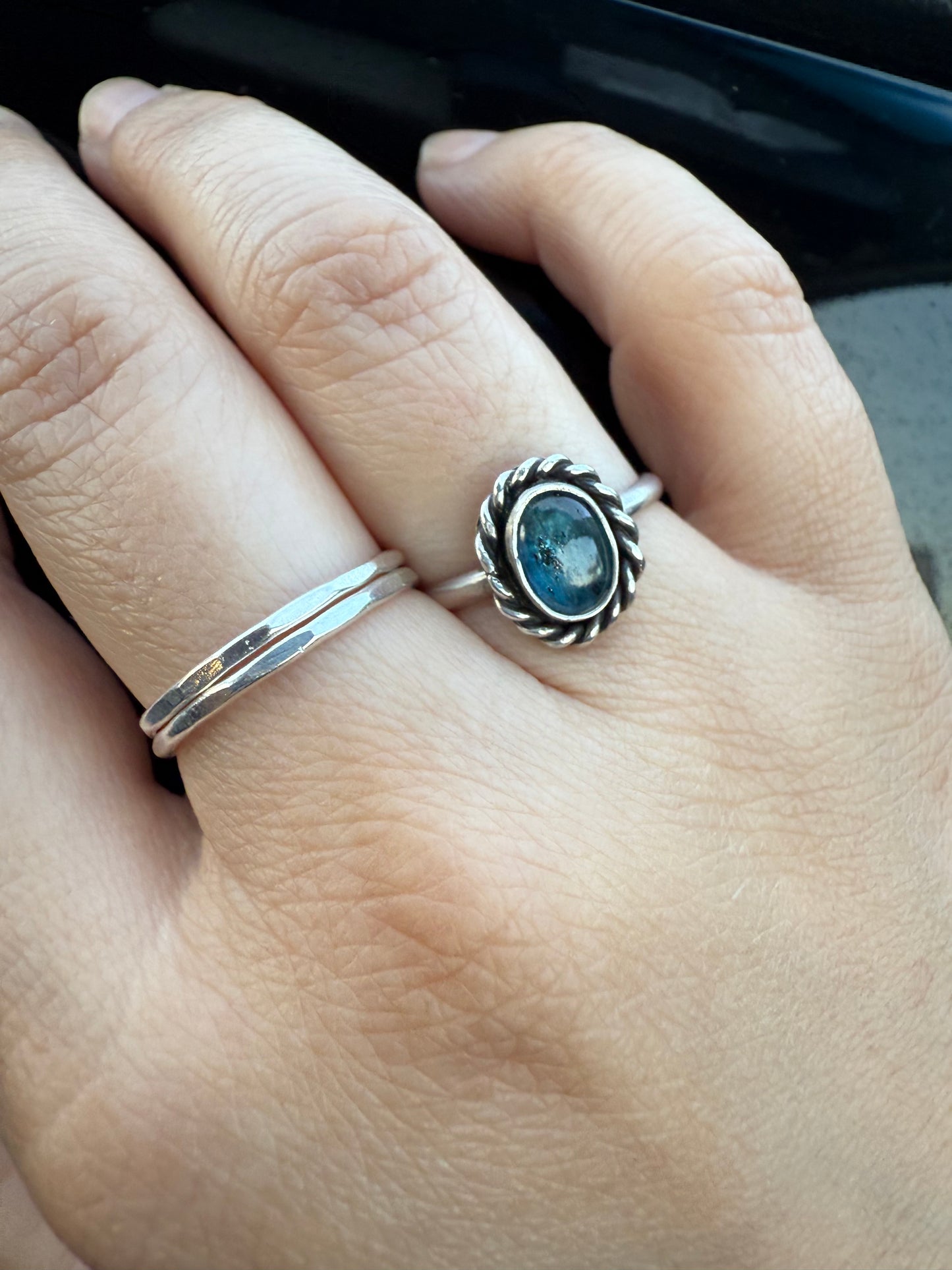 Twisted blue ring